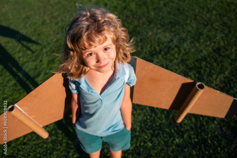 Funny child boy playing with toy jetpack. Kid dreams of future. Kid pilot  dreaming. Childhood dream concept. Blonde cute daydreamer child dream on  fly. Dreams and imagination. Creative kid. Stock Photo |